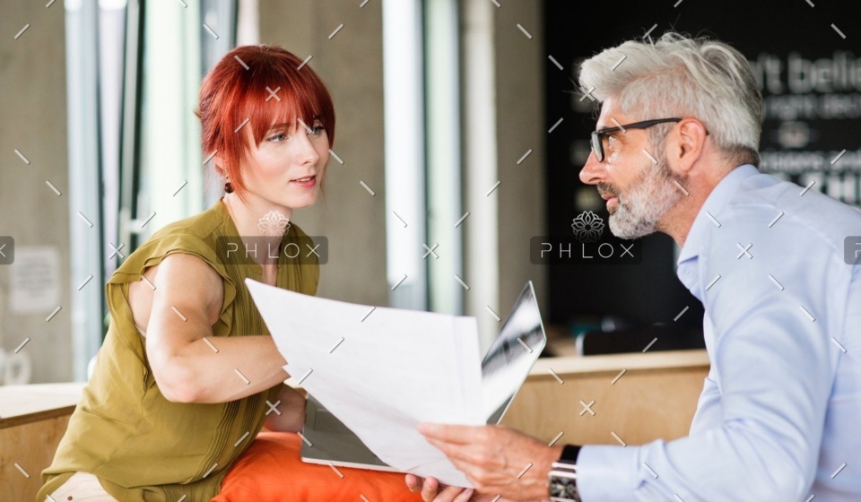 demo-attachment-550-business-people-in-creative-office-consulting-a-P48WVT9